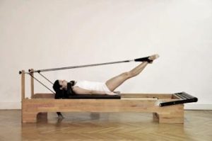 Esercizio Short Spine su Reformer 1 Short Spine Reformer 1
